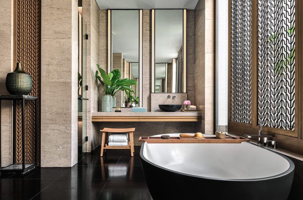 hotel special black and white bathtub and vassel sink