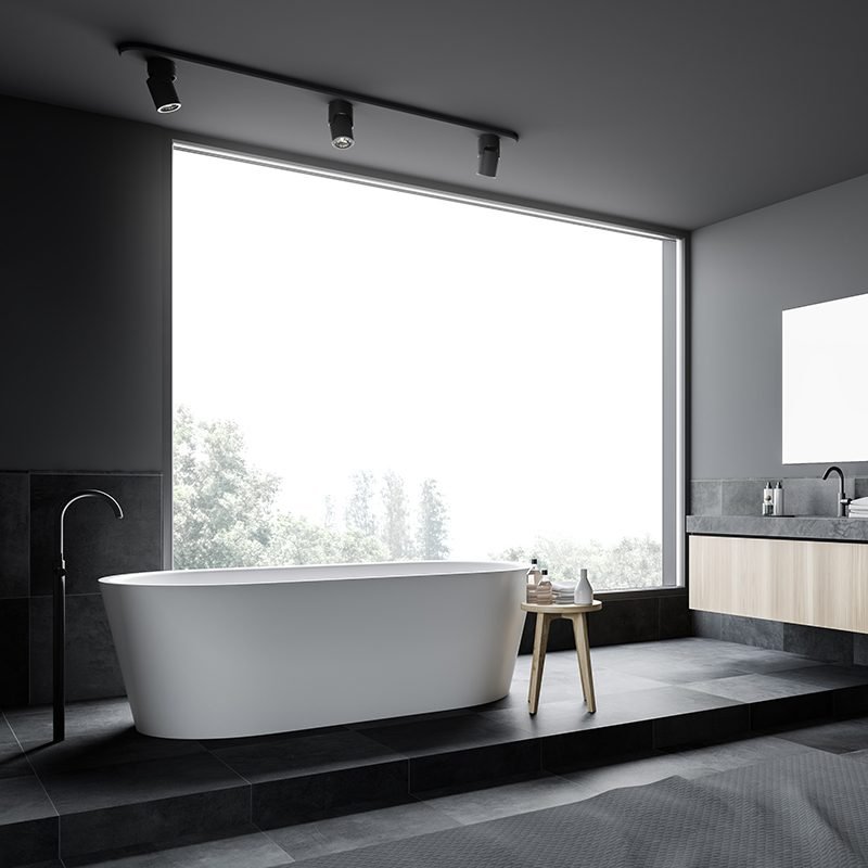 gray and tiled bathroom corner, tub and sink